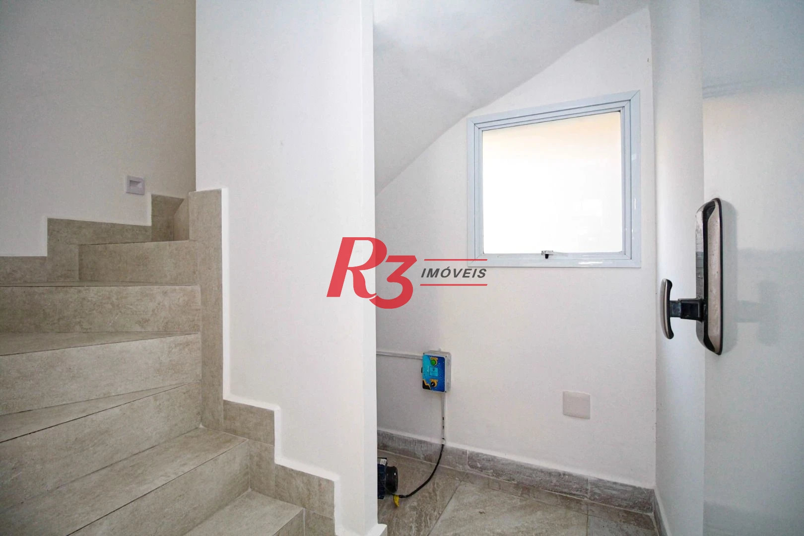 Village com 3 dormitórios à venda, 200 m² por R$ 1.200.000,00 - Gonzaga - Santos/SP