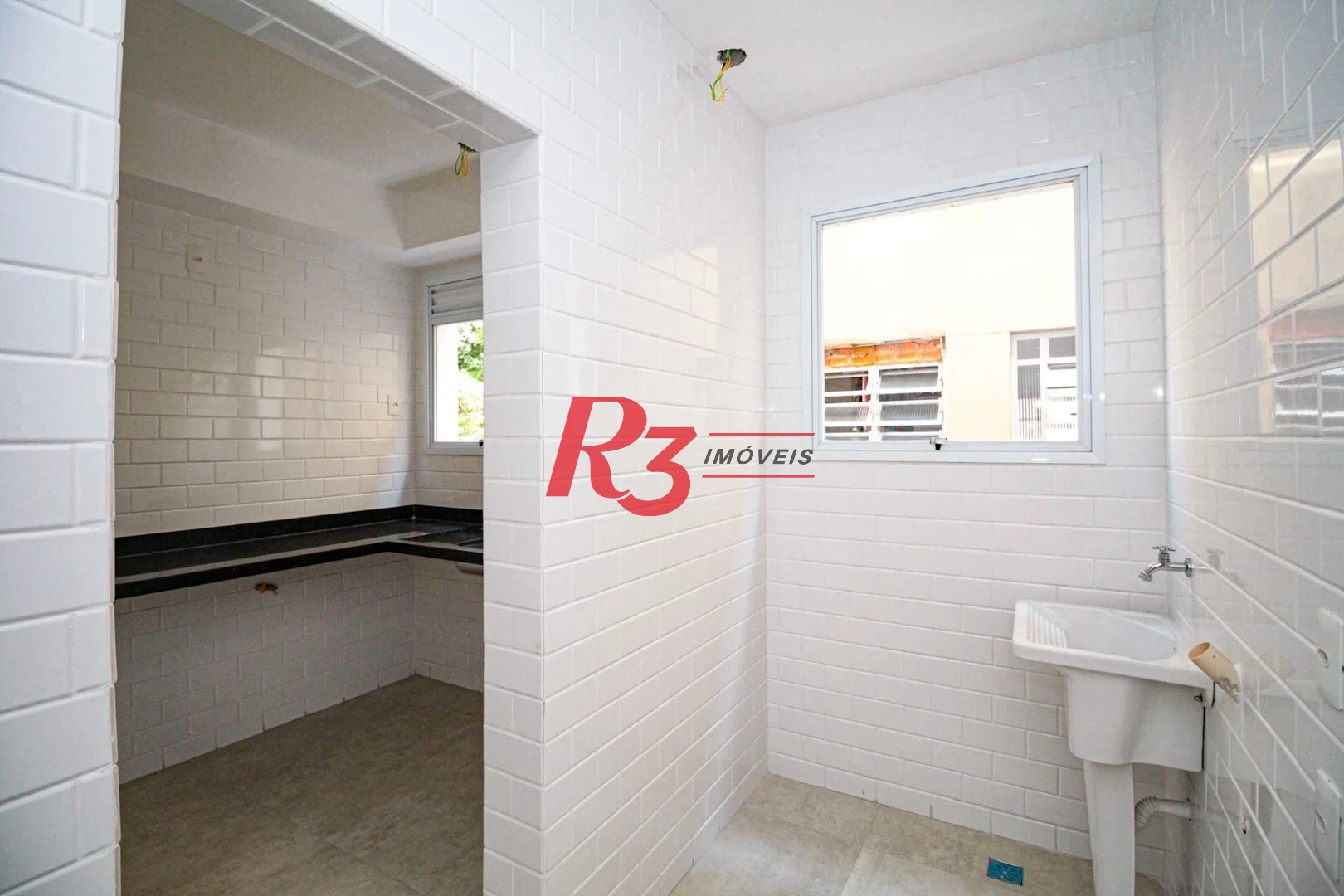 Village com 3 dormitórios à venda, 200 m² por R$ 1.200.000,00 - Gonzaga - Santos/SP