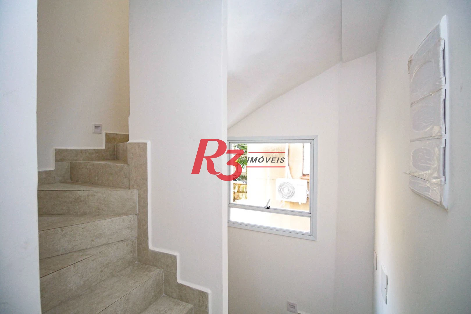 Village com 3 dormitórios à venda, 200 m² por R$ 1.200.000,00 - Gonzaga - Santos/SP