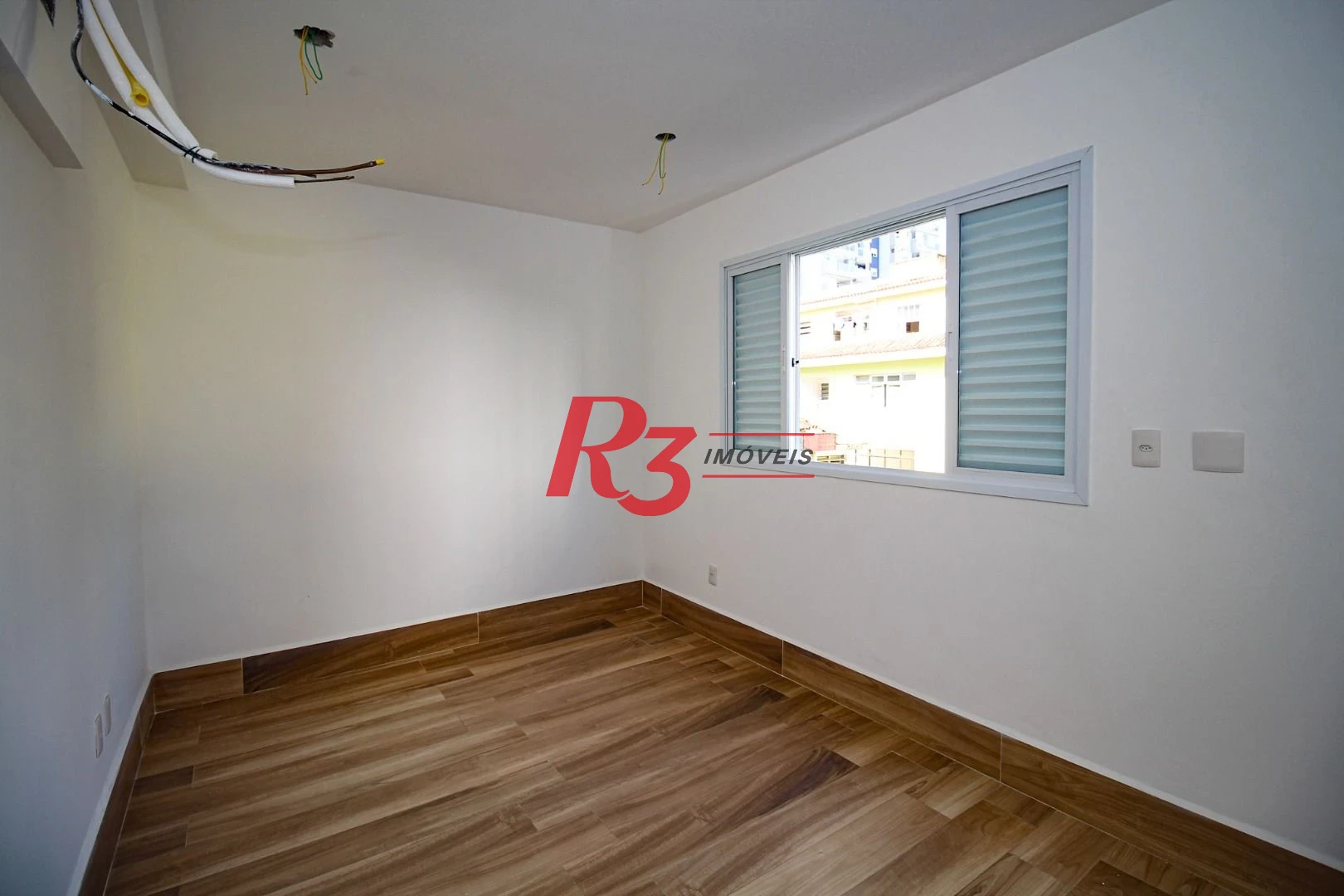 Village com 3 dormitórios à venda, 200 m² por R$ 1.200.000,00 - Gonzaga - Santos/SP