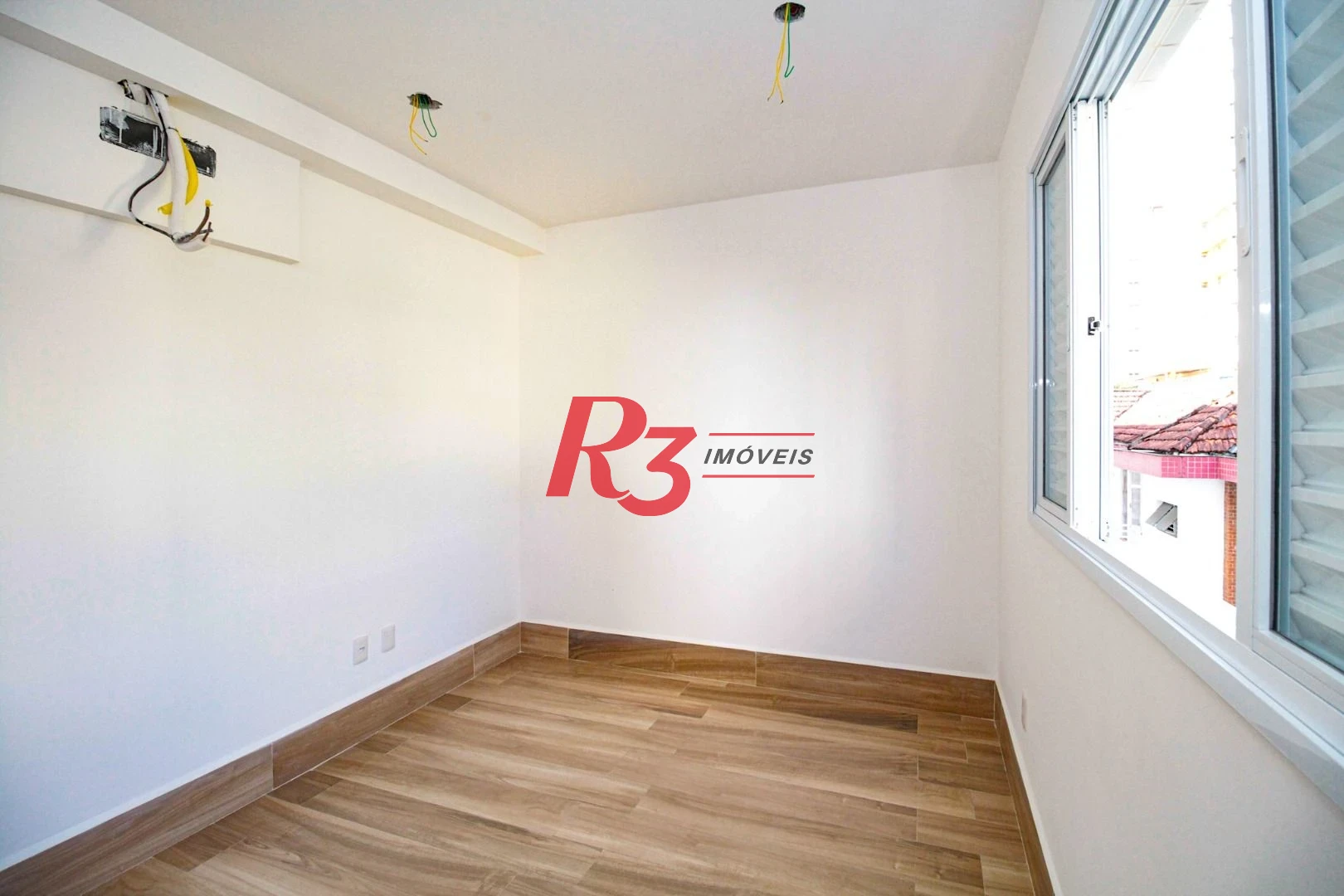 Village com 3 dormitórios à venda, 200 m² por R$ 1.200.000,00 - Gonzaga - Santos/SP