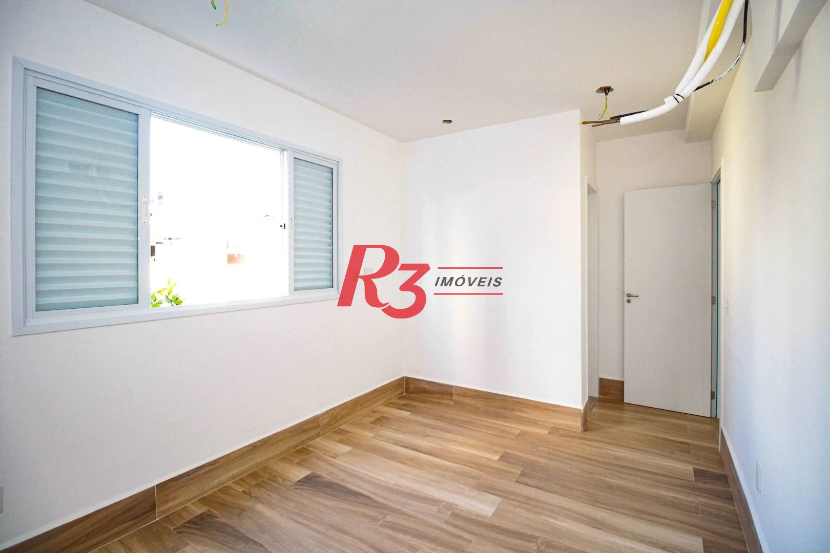 Village com 3 dormitórios à venda, 200 m² por R$ 1.200.000,00 - Gonzaga - Santos/SP