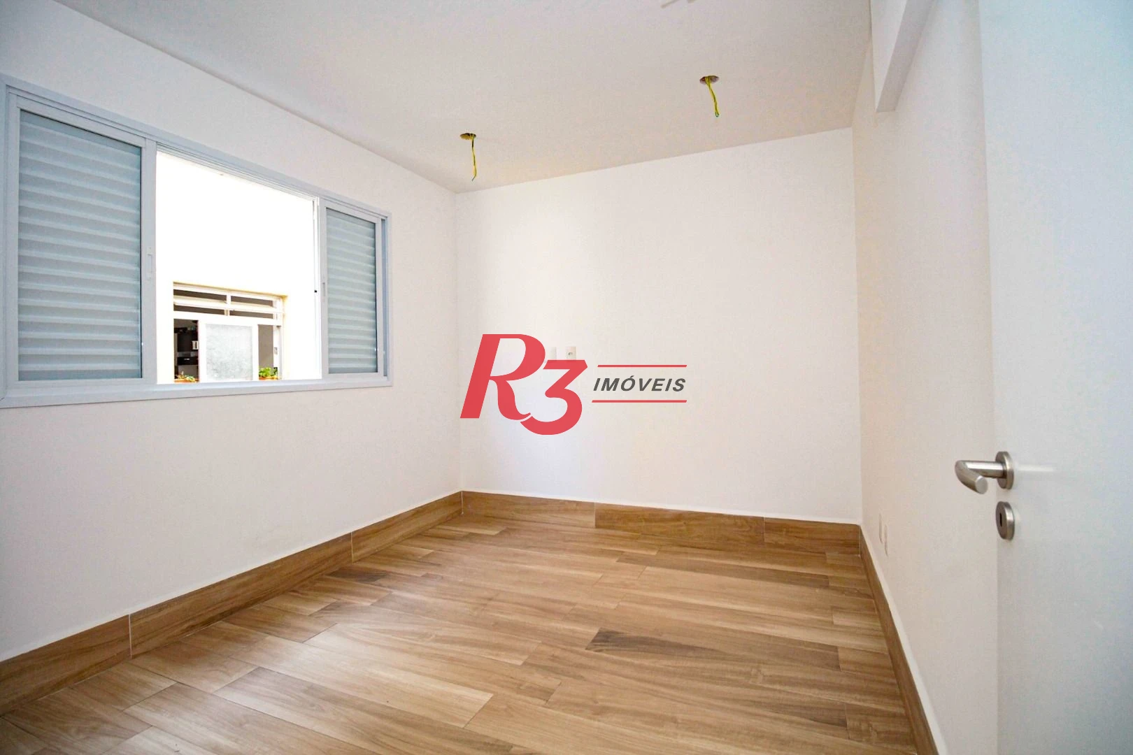 Village com 3 dormitórios à venda, 200 m² por R$ 1.200.000,00 - Gonzaga - Santos/SP