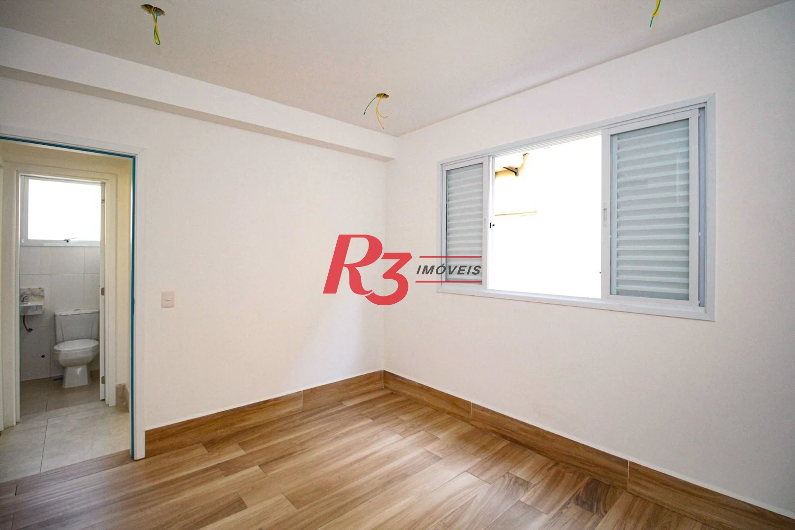 Village com 3 dormitórios à venda, 200 m² por R$ 1.200.000,00 - Gonzaga - Santos/SP