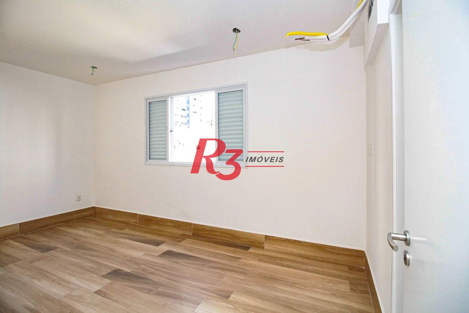 Village com 3 dormitórios à venda, 200 m² por R$ 1.200.000,00 - Gonzaga - Santos/SP