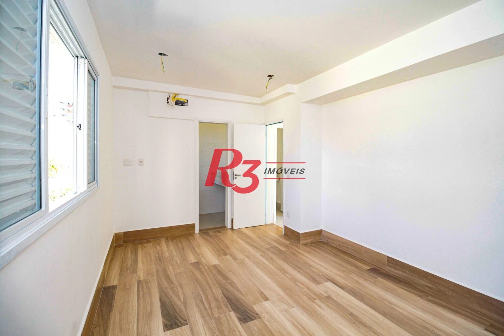 Village com 3 dormitórios à venda, 200 m² por R$ 1.200.000,00 - Gonzaga - Santos/SP
