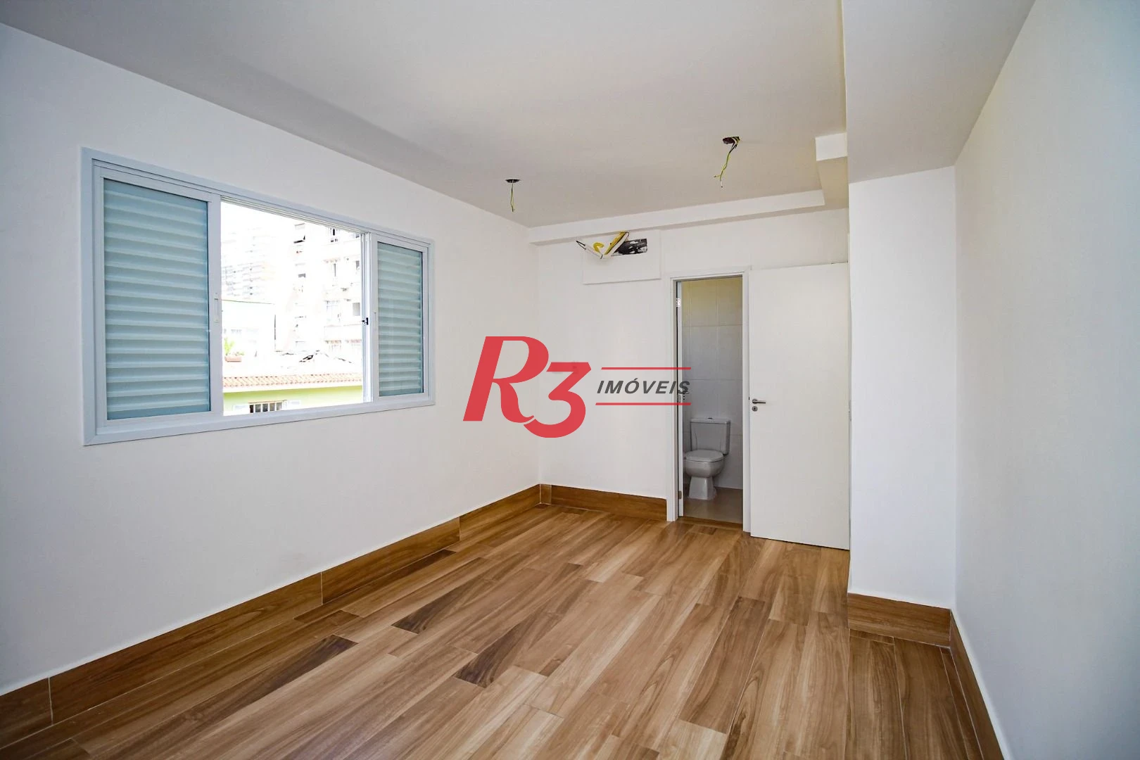 Village com 3 dormitórios à venda, 200 m² por R$ 1.200.000,00 - Gonzaga - Santos/SP