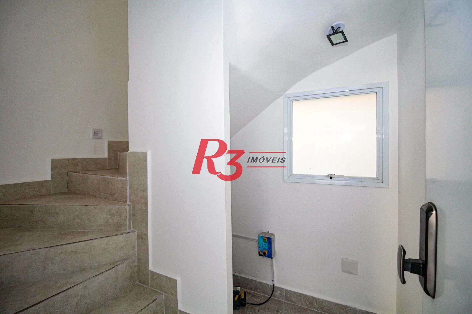 Sobrado com 3 dormitórios à venda, 190 m² por R$ 800.000,00 - Gonzaga - Santos/SP