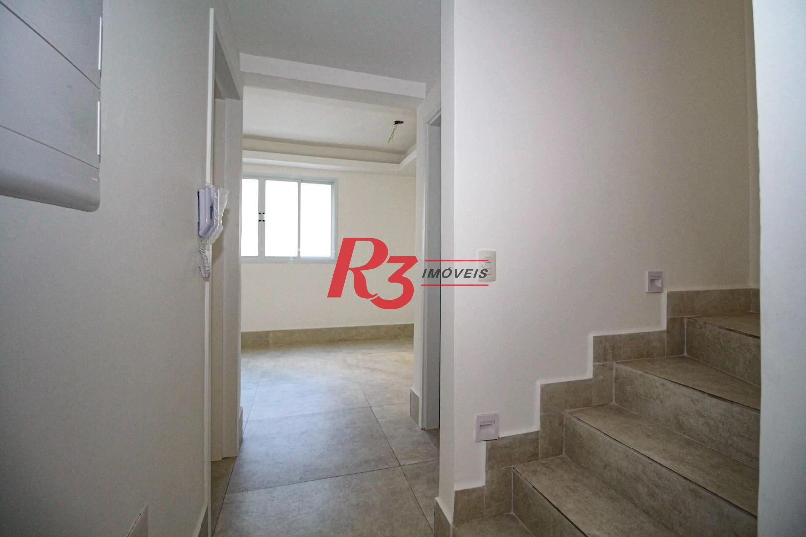 Sobrado com 3 dormitórios à venda, 190 m² por R$ 800.000,00 - Gonzaga - Santos/SP