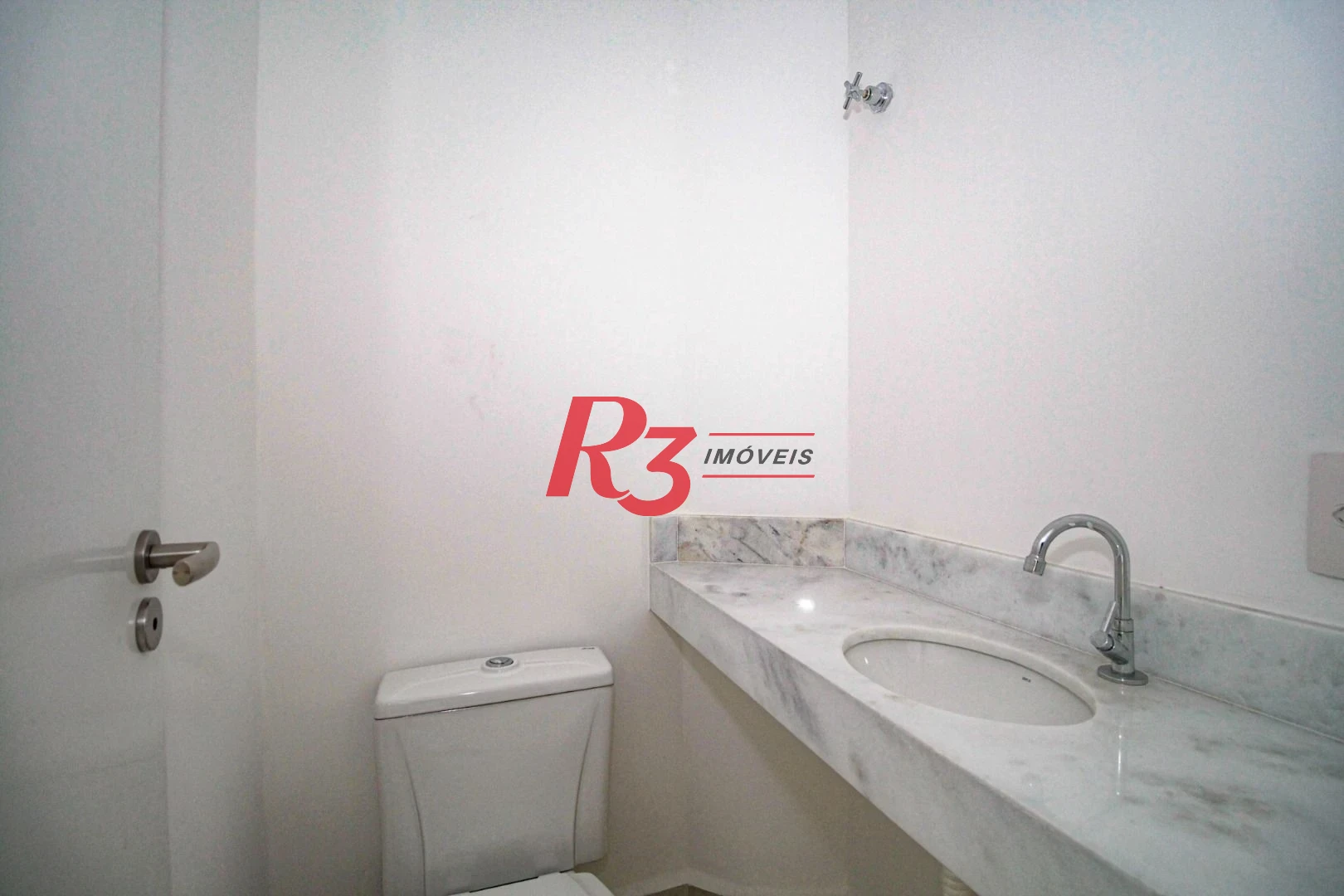 Sobrado com 3 dormitórios à venda, 190 m² por R$ 800.000,00 - Gonzaga - Santos/SP