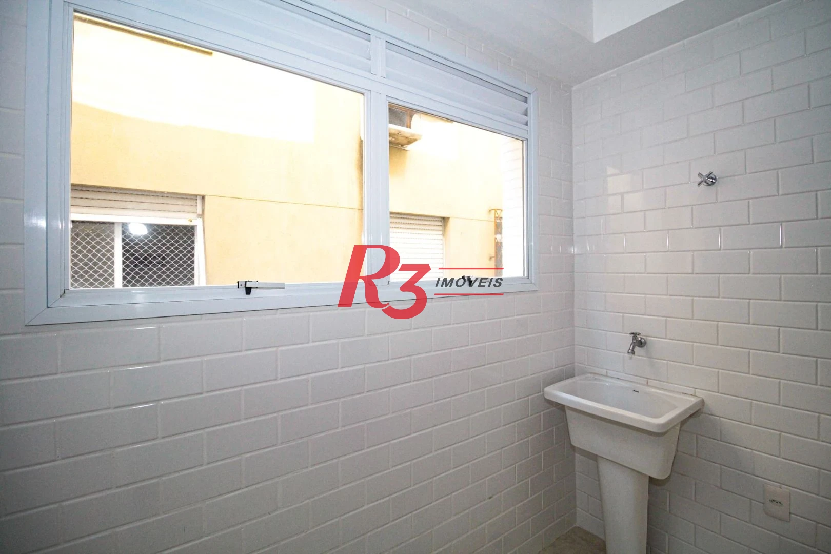 Sobrado com 3 dormitórios à venda, 190 m² por R$ 800.000,00 - Gonzaga - Santos/SP