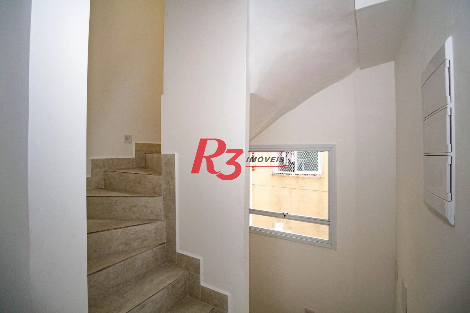 Sobrado com 3 dormitórios à venda, 190 m² por R$ 800.000,00 - Gonzaga - Santos/SP