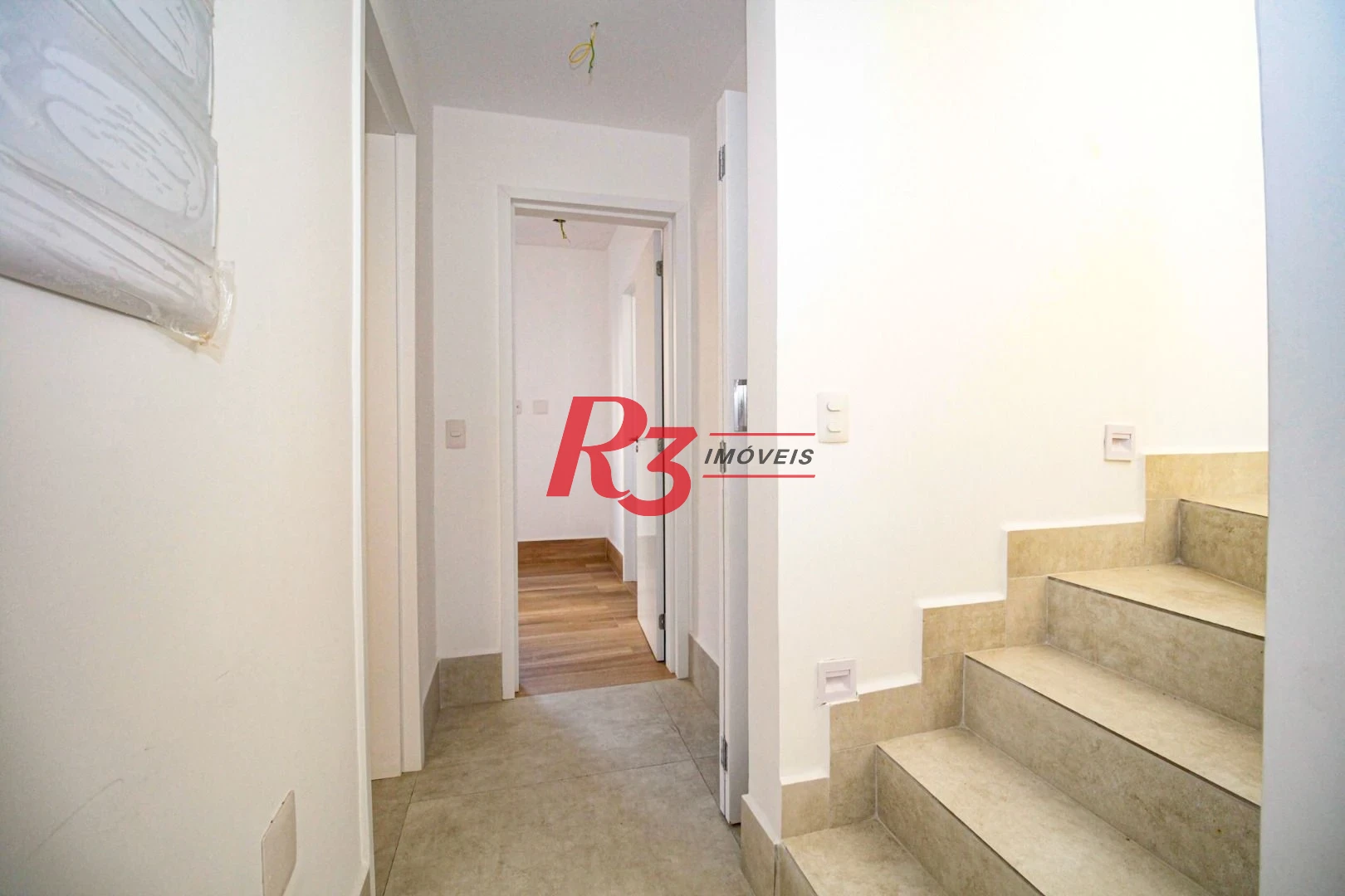 Sobrado com 3 dormitórios à venda, 190 m² por R$ 800.000,00 - Gonzaga - Santos/SP