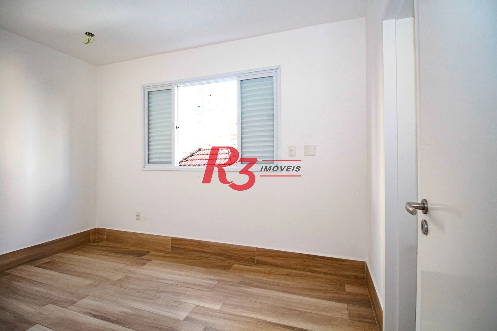 Sobrado com 3 dormitórios à venda, 190 m² por R$ 800.000,00 - Gonzaga - Santos/SP