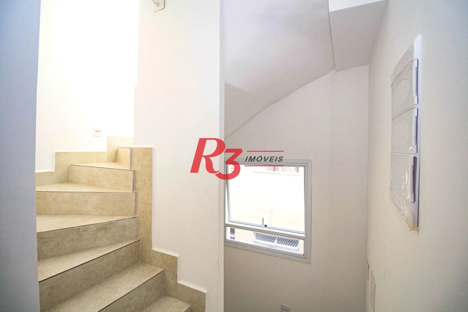 Sobrado com 3 dormitórios à venda, 190 m² por R$ 800.000,00 - Gonzaga - Santos/SP