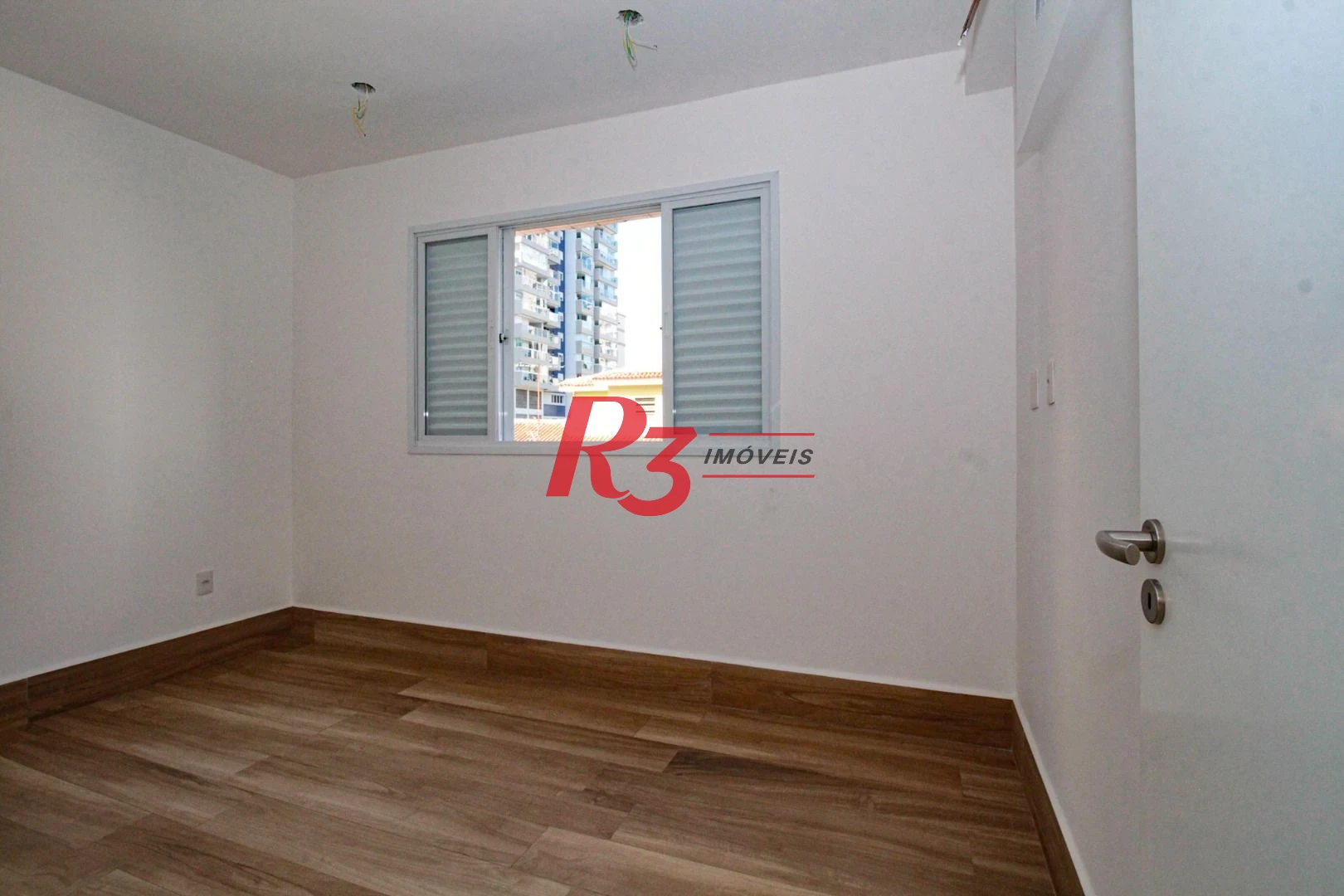 Sobrado com 3 dormitórios à venda, 190 m² por R$ 800.000,00 - Gonzaga - Santos/SP