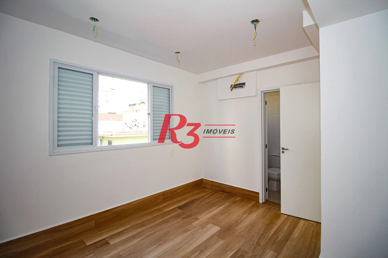Sobrado com 3 dormitórios à venda, 190 m² por R$ 800.000,00 - Gonzaga - Santos/SP