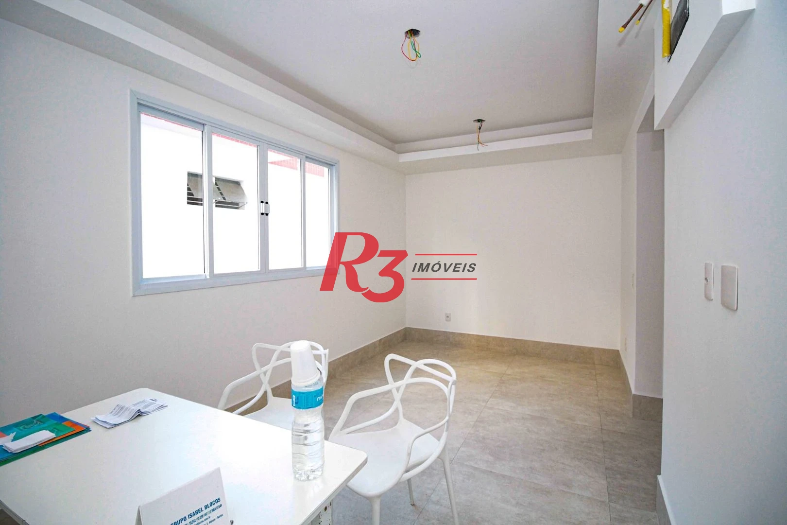 Sobrado com 3 dormitórios à venda, 190 m² por R$ 1.050.000,00 - Gonzaga - Santos/SP