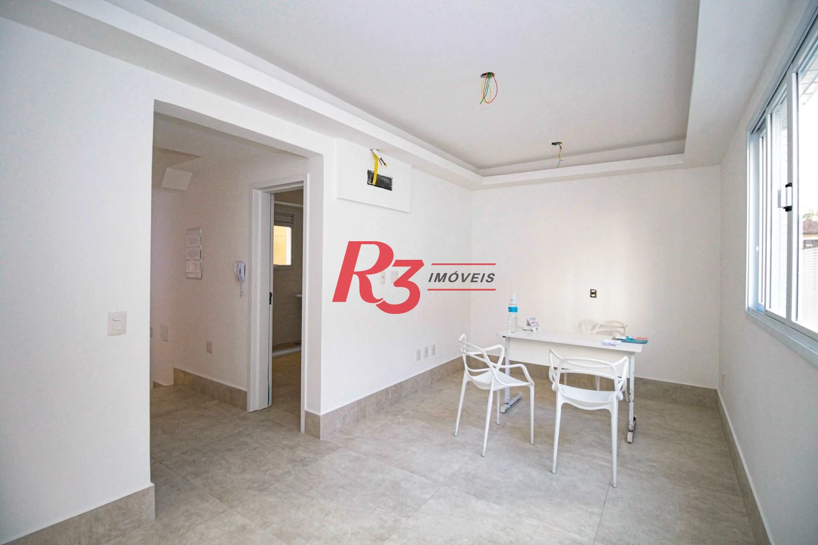 Sobrado com 3 dormitórios à venda, 190 m² por R$ 1.050.000,00 - Gonzaga - Santos/SP