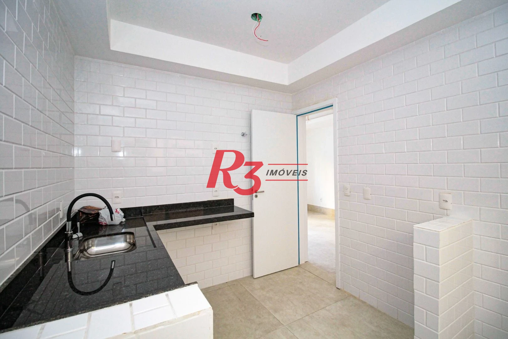 Sobrado com 3 dormitórios à venda, 190 m² por R$ 1.050.000,00 - Gonzaga - Santos/SP