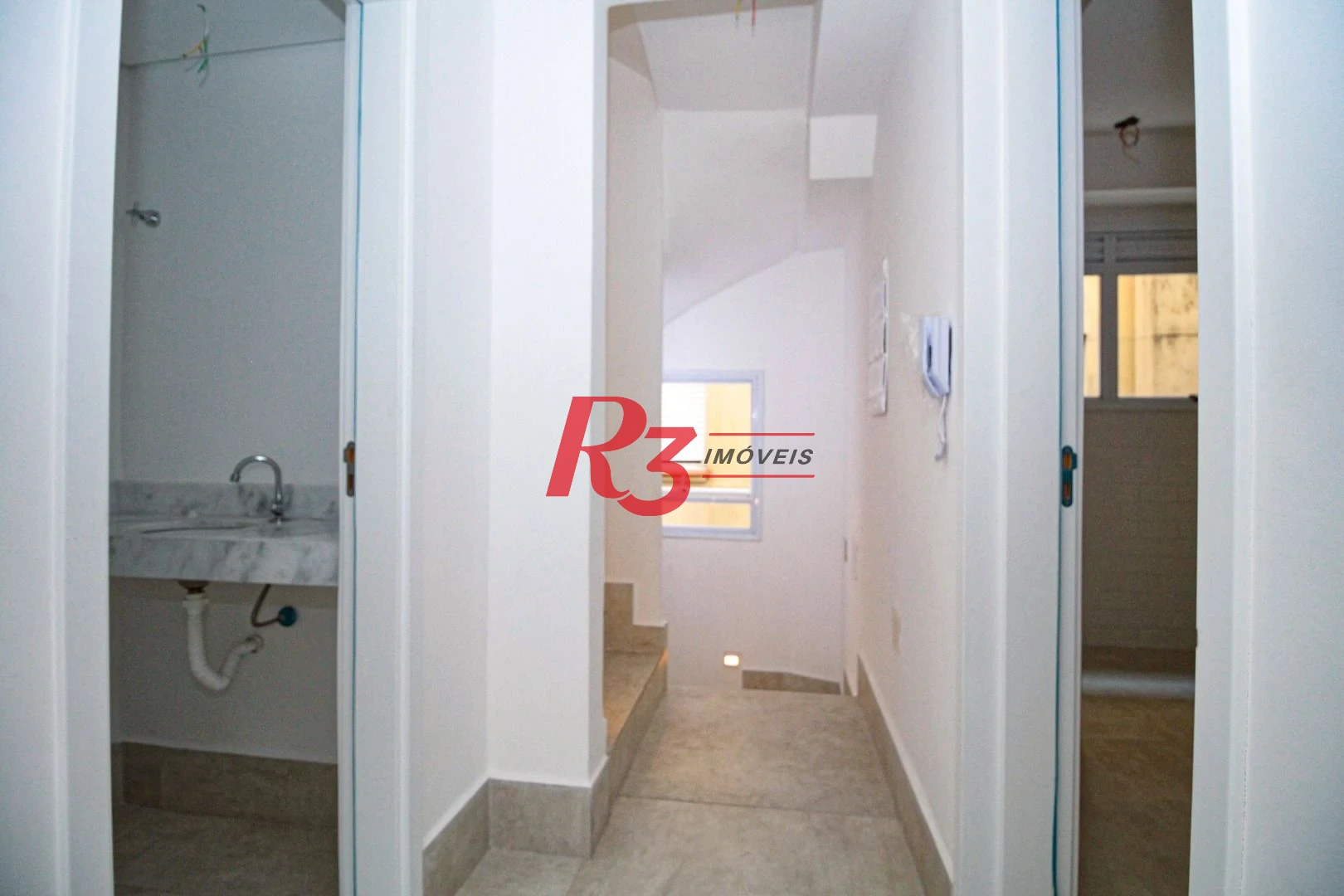 Sobrado com 3 dormitórios à venda, 190 m² por R$ 1.050.000,00 - Gonzaga - Santos/SP