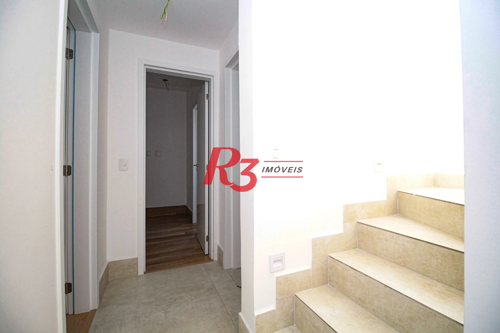 Sobrado com 3 dormitórios à venda, 190 m² por R$ 1.050.000,00 - Gonzaga - Santos/SP