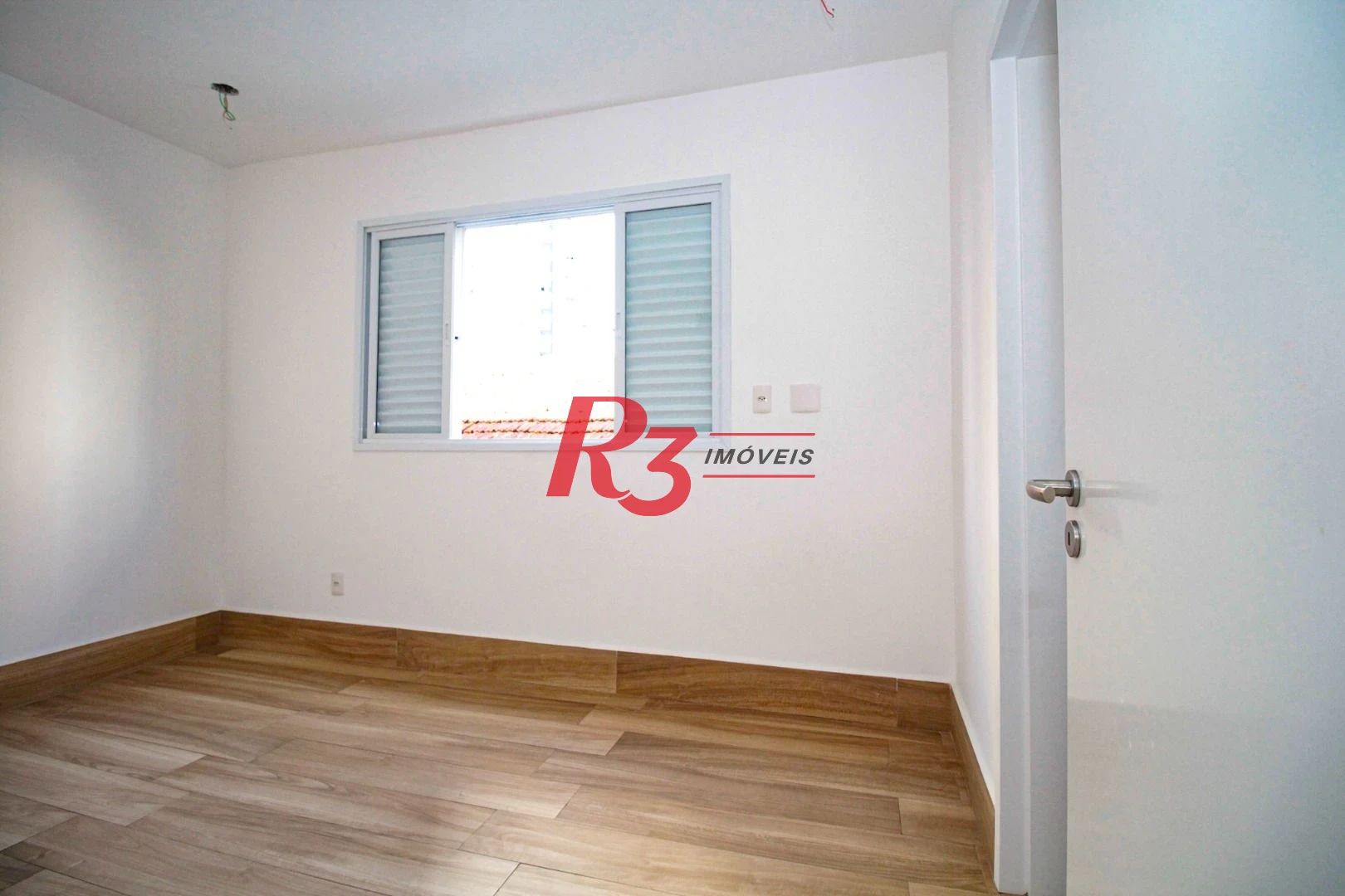 Sobrado com 3 dormitórios à venda, 190 m² por R$ 1.050.000,00 - Gonzaga - Santos/SP