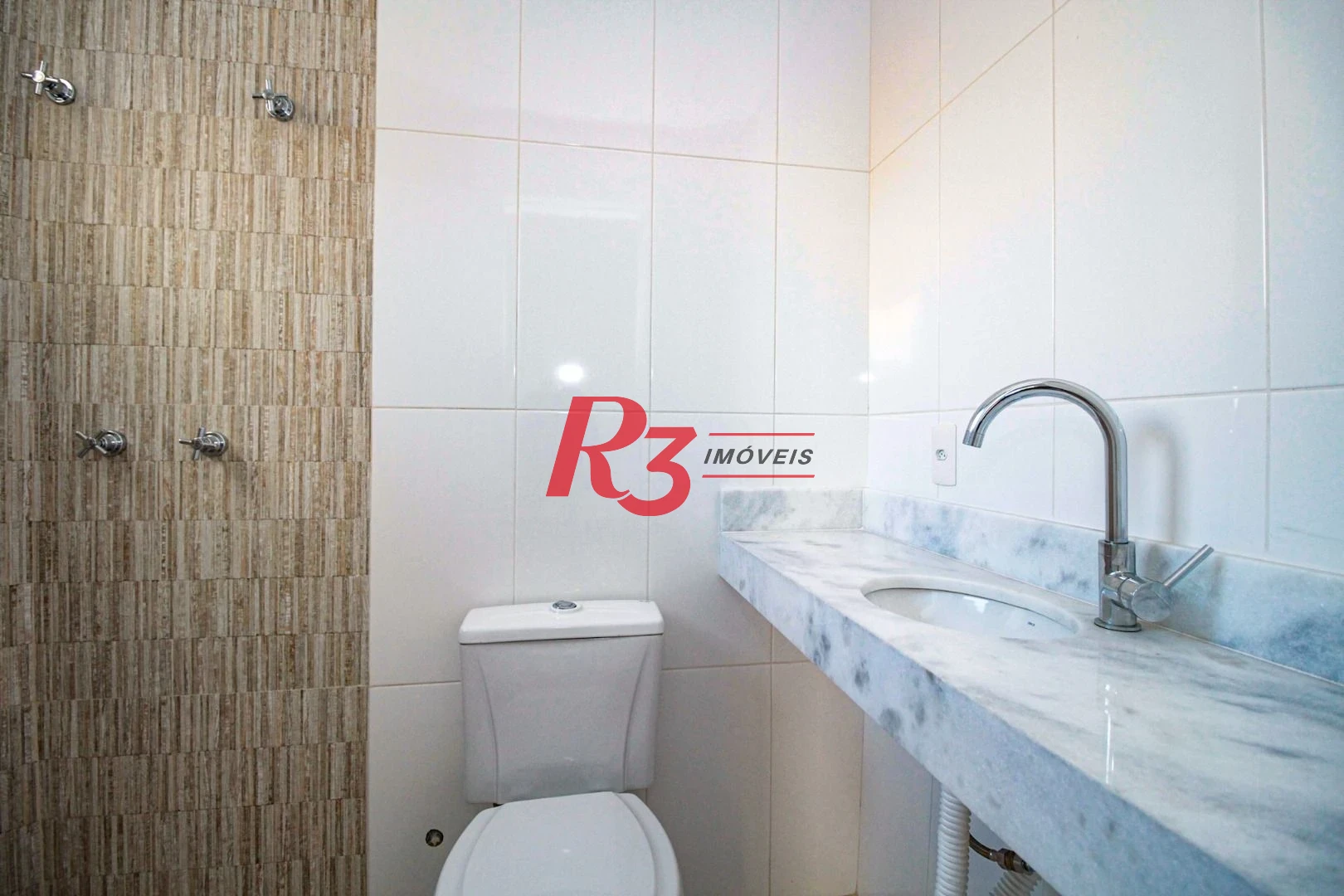 Sobrado com 3 dormitórios à venda, 190 m² por R$ 1.050.000,00 - Gonzaga - Santos/SP