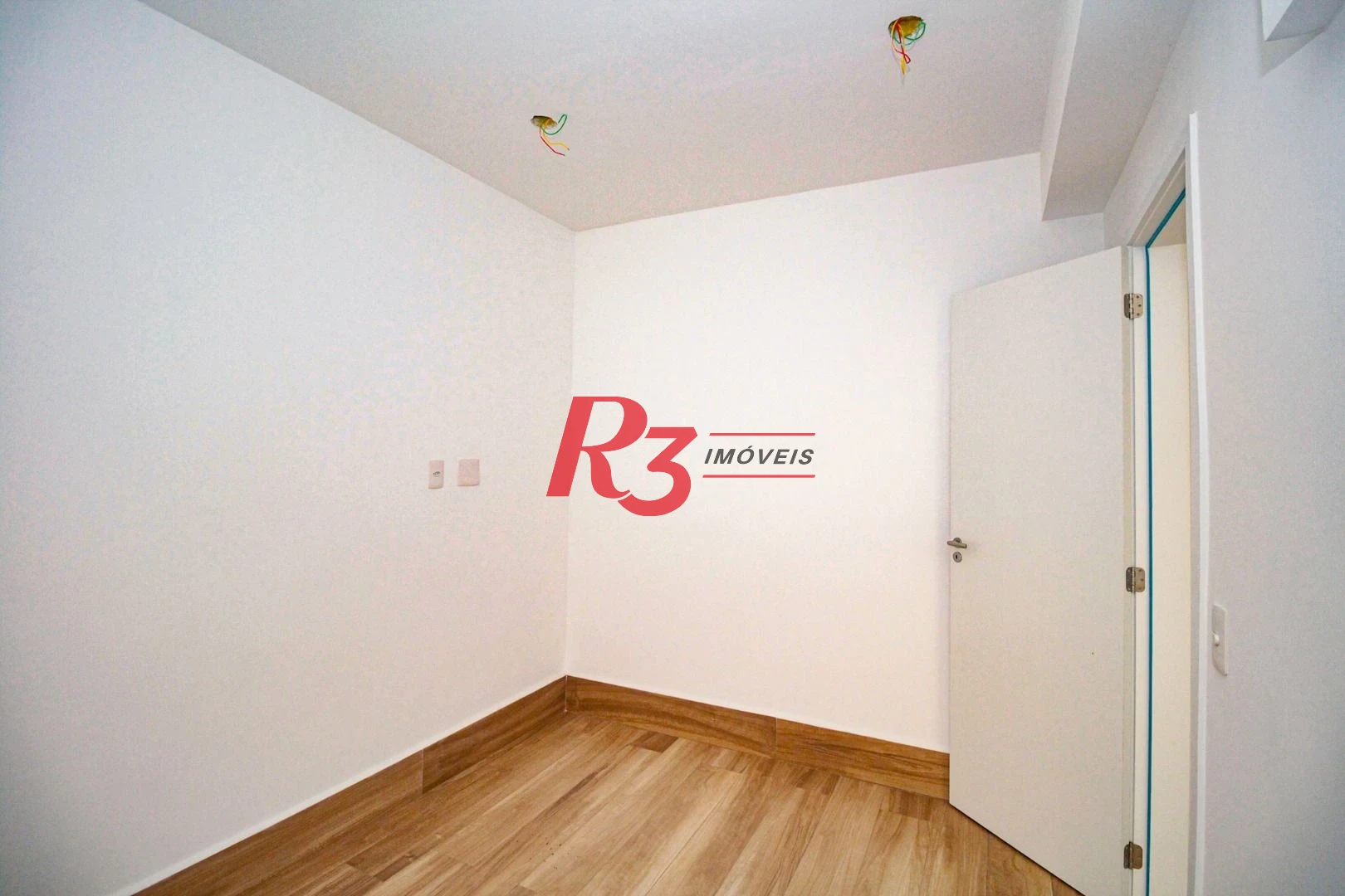 Sobrado com 3 dormitórios à venda, 190 m² por R$ 1.050.000,00 - Gonzaga - Santos/SP