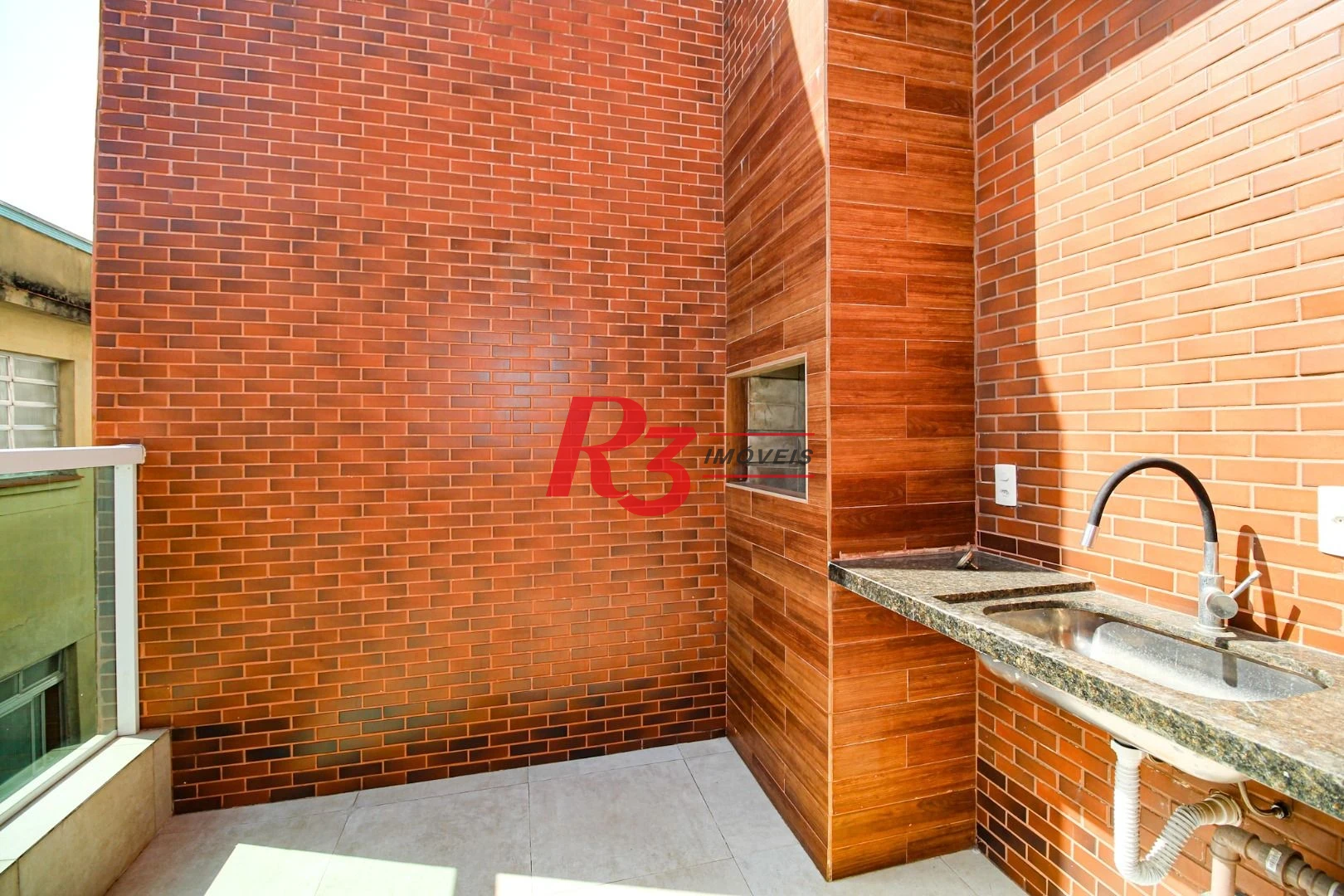 Sobrado com 3 dormitórios à venda, 190 m² por R$ 1.050.000,00 - Gonzaga - Santos/SP