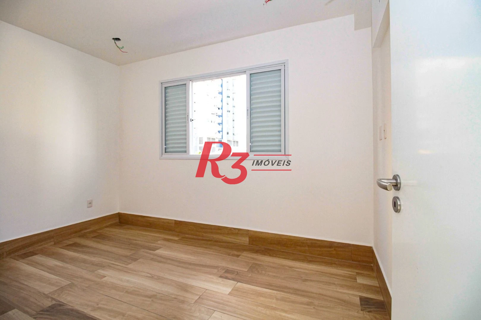 Sobrado com 3 dormitórios à venda, 190 m² por R$ 1.050.000,00 - Gonzaga - Santos/SP