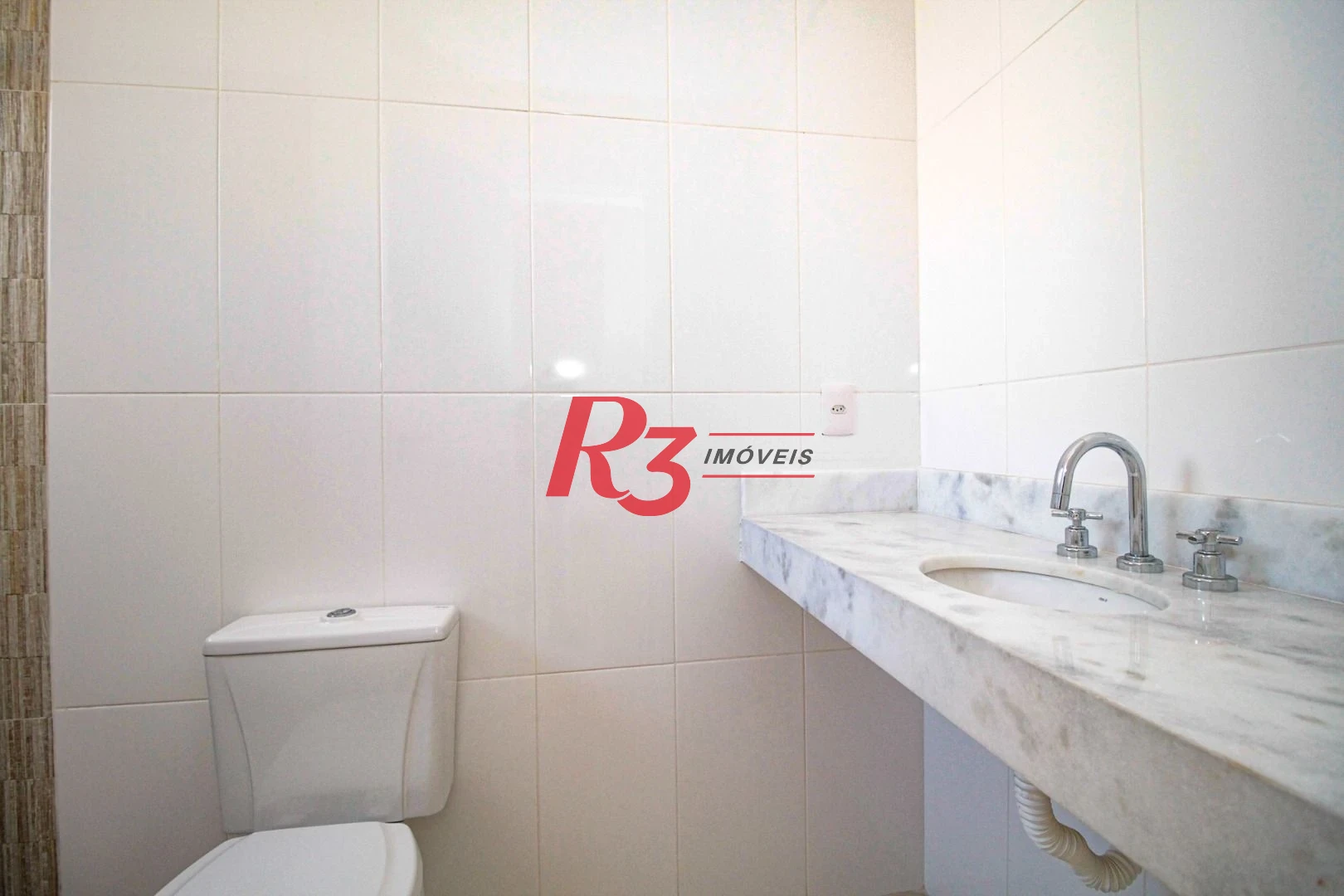 Sobrado com 3 dormitórios à venda, 190 m² por R$ 1.050.000,00 - Gonzaga - Santos/SP