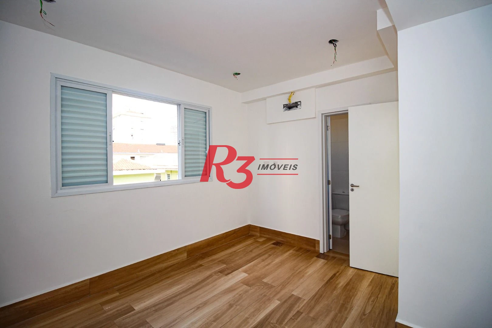 Sobrado com 3 dormitórios à venda, 190 m² por R$ 1.050.000,00 - Gonzaga - Santos/SP