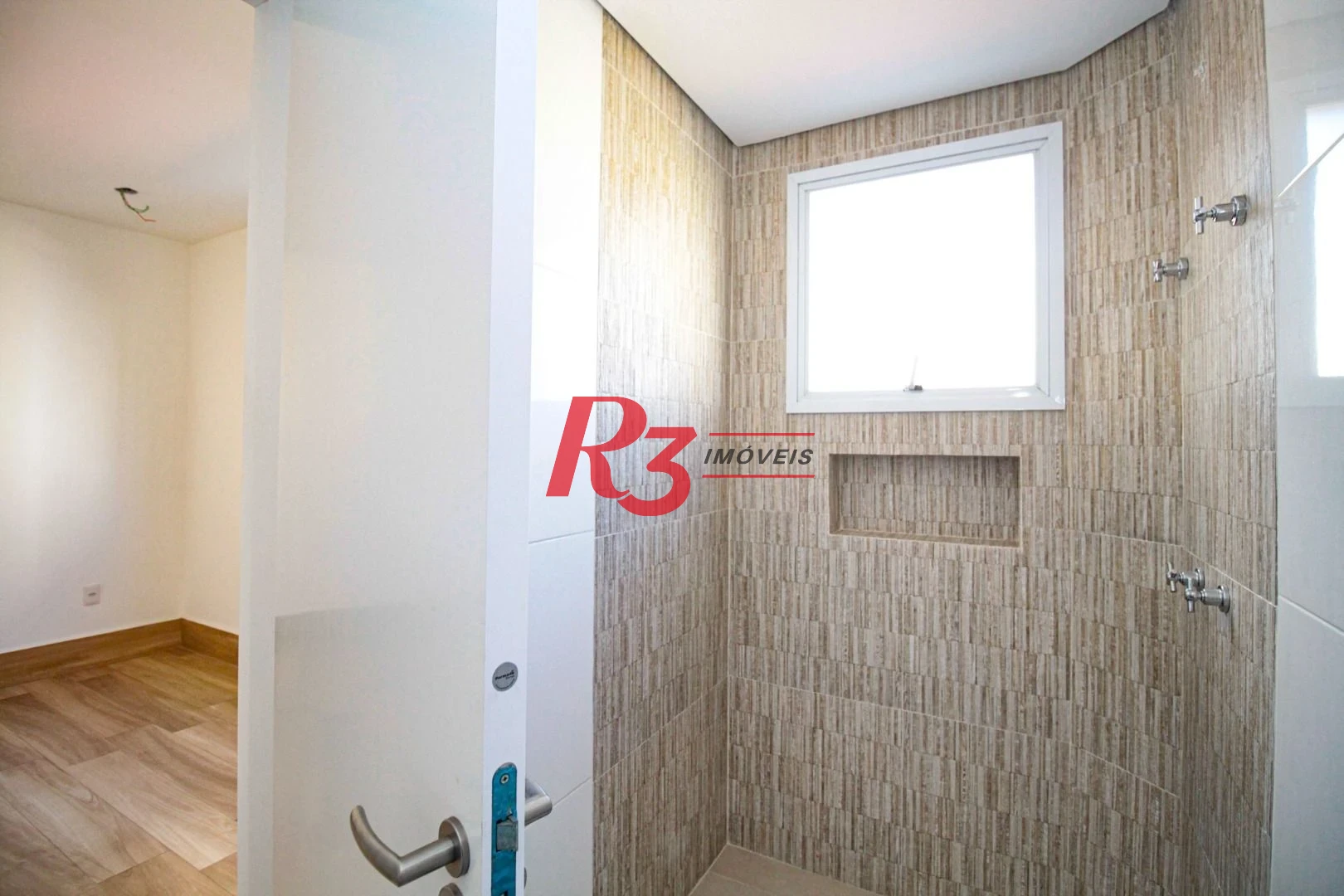 Sobrado com 3 dormitórios à venda, 190 m² por R$ 1.050.000,00 - Gonzaga - Santos/SP