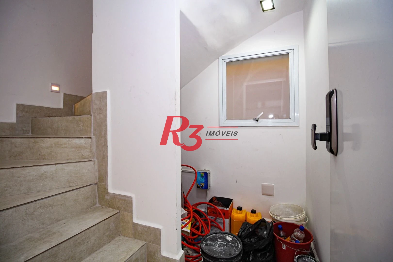 Sobrado com 3 dormitórios à venda, 190 m² por R$ 1.050.000,00 - Gonzaga - Santos/SP