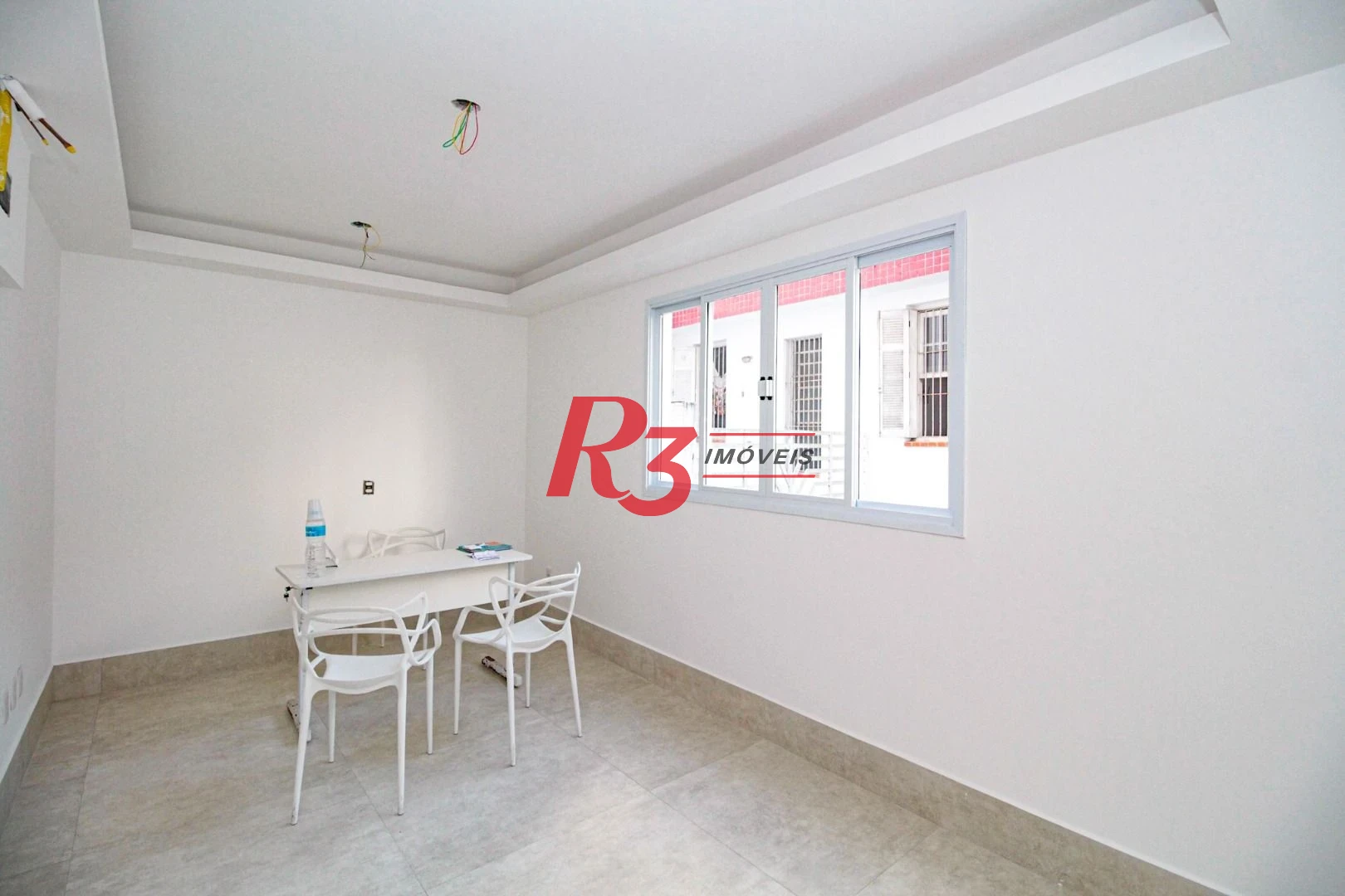 Sobrado com 3 dormitórios à venda, 190 m² por R$ 1.050.000,00 - Gonzaga - Santos/SP