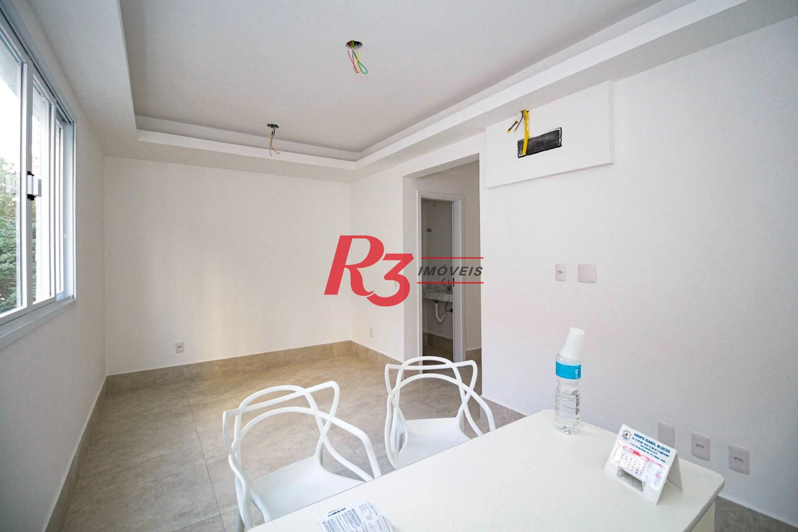 Sobrado com 3 dormitórios à venda, 190 m² por R$ 1.050.000,00 - Gonzaga - Santos/SP