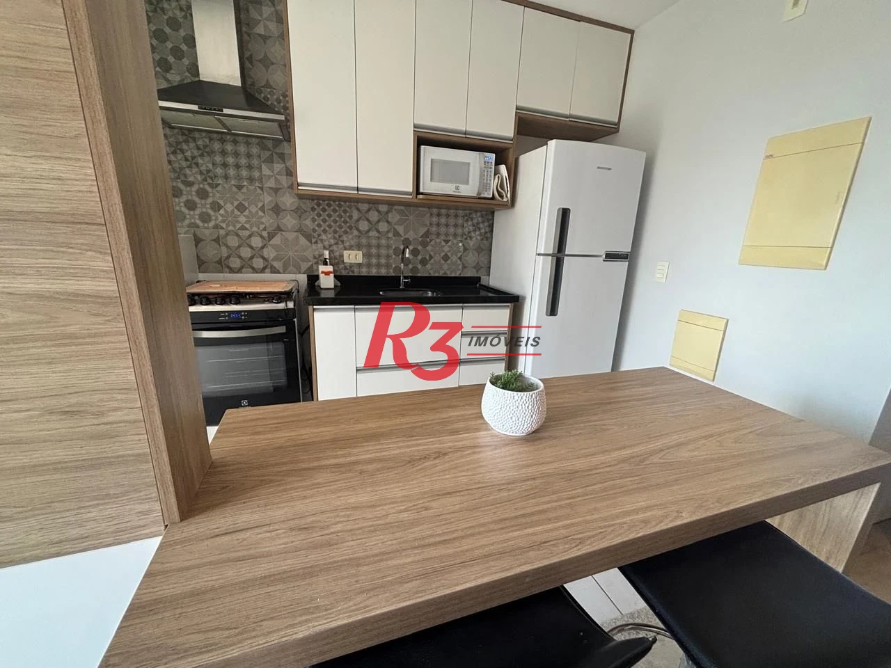 Apartamento Duplex com 1 dormitório para alugar, 60 m² por R$ 6.320,00/mês - Gonzaga - Santos/SP
