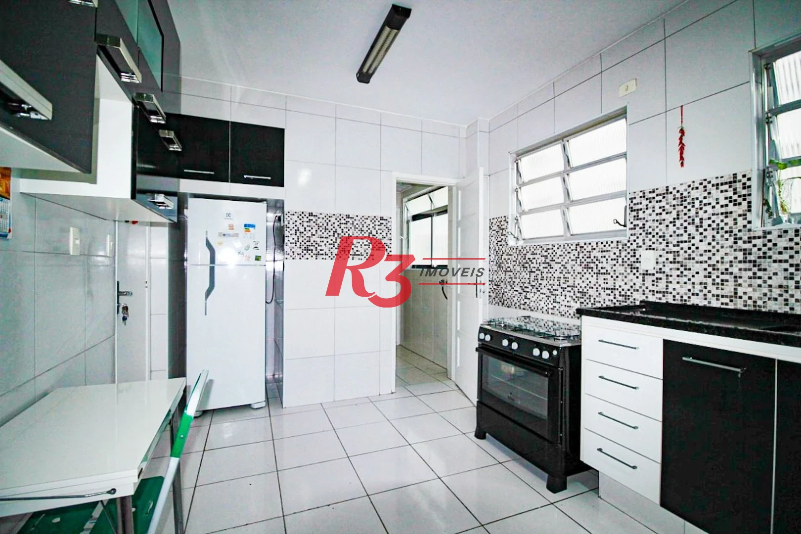 Apartamento com 3 dormitórios à venda, 156 m² por R$ 950.000,00 - Gonzaga - Santos/SP