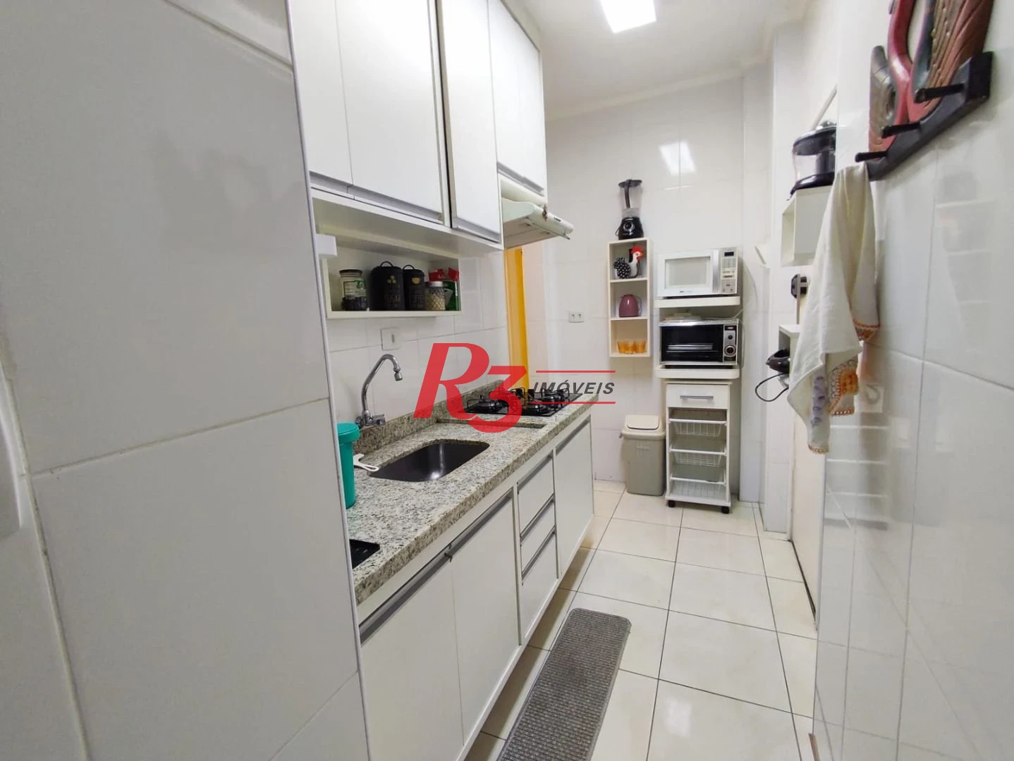 Apartamento com 2 dormitórios à venda, 92 m² por R$ 660.000,00 - Gonzaga - Santos/SP
