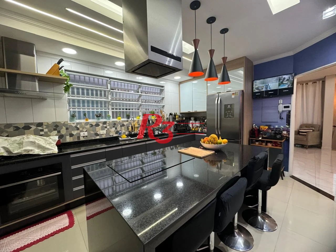 Casa com 3 dormitórios à venda, 189 m² por R$ 1.680.000,00 - Campo Grande - Santos/SP