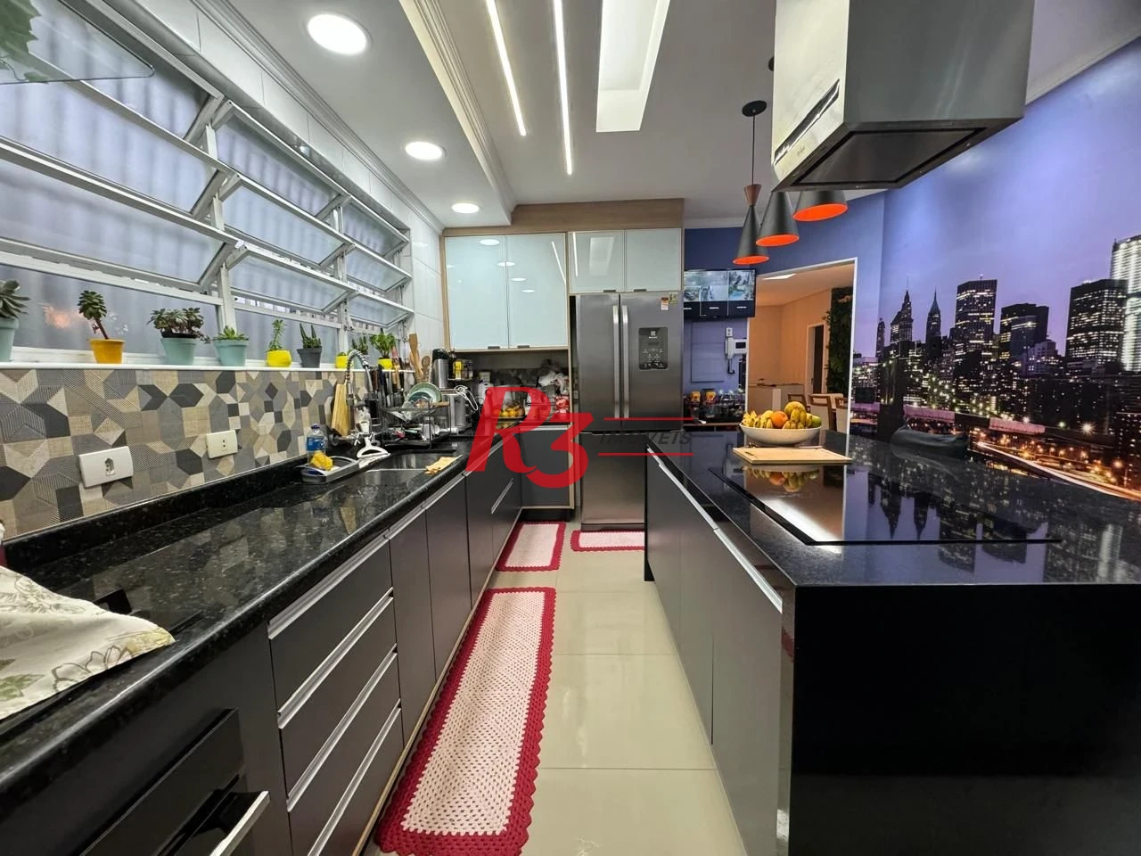 Casa com 3 dormitórios à venda, 189 m² por R$ 1.680.000,00 - Campo Grande - Santos/SP