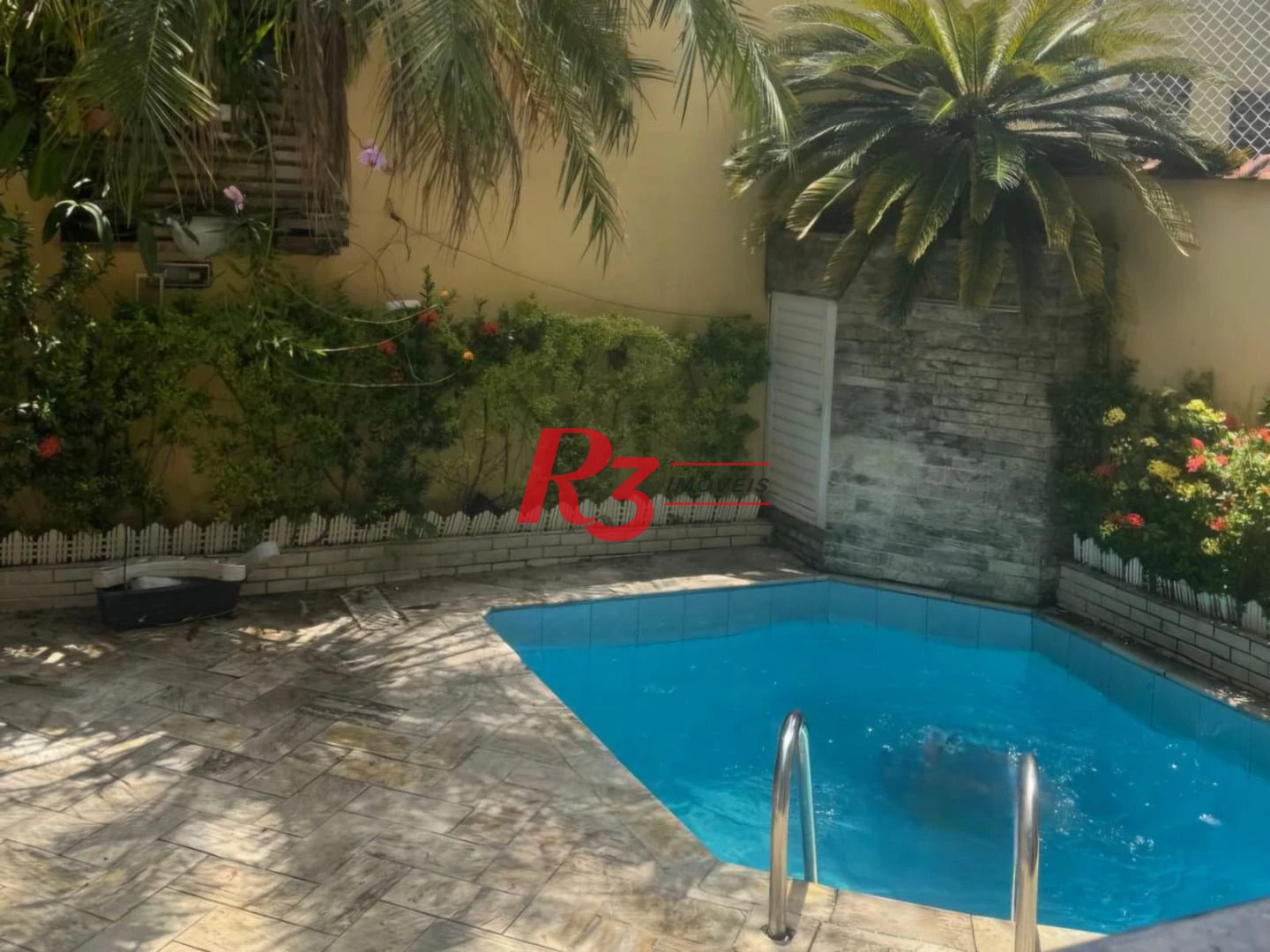 Casa com 3 dormitórios à venda, 189 m² por R$ 1.680.000,00 - Campo Grande - Santos/SP
