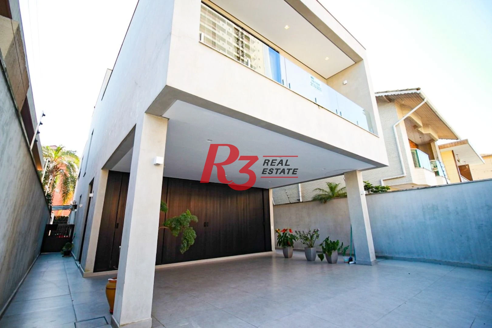 Sobrado com 4 dormitórios à venda, 375 m² - Ponta da Praia - Santos/SP