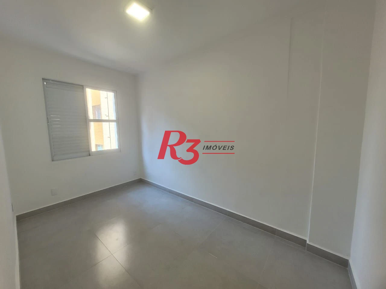Apartamento com 2 dormitórios à venda, 70 m² por R$ 439.000,00 - Gonzaga - Santos/SP