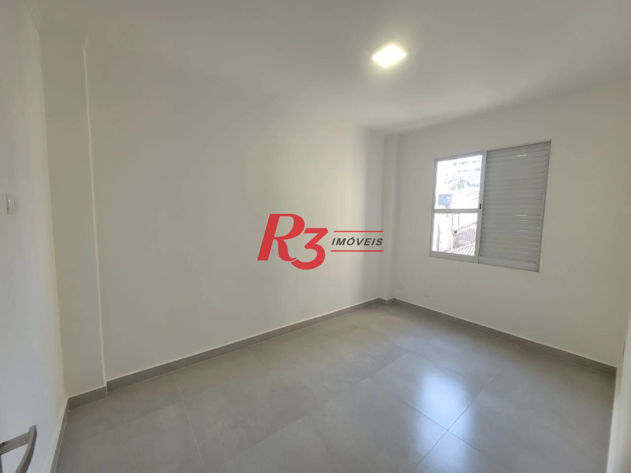 Apartamento com 2 dormitórios à venda, 70 m² por R$ 439.000,00 - Gonzaga - Santos/SP