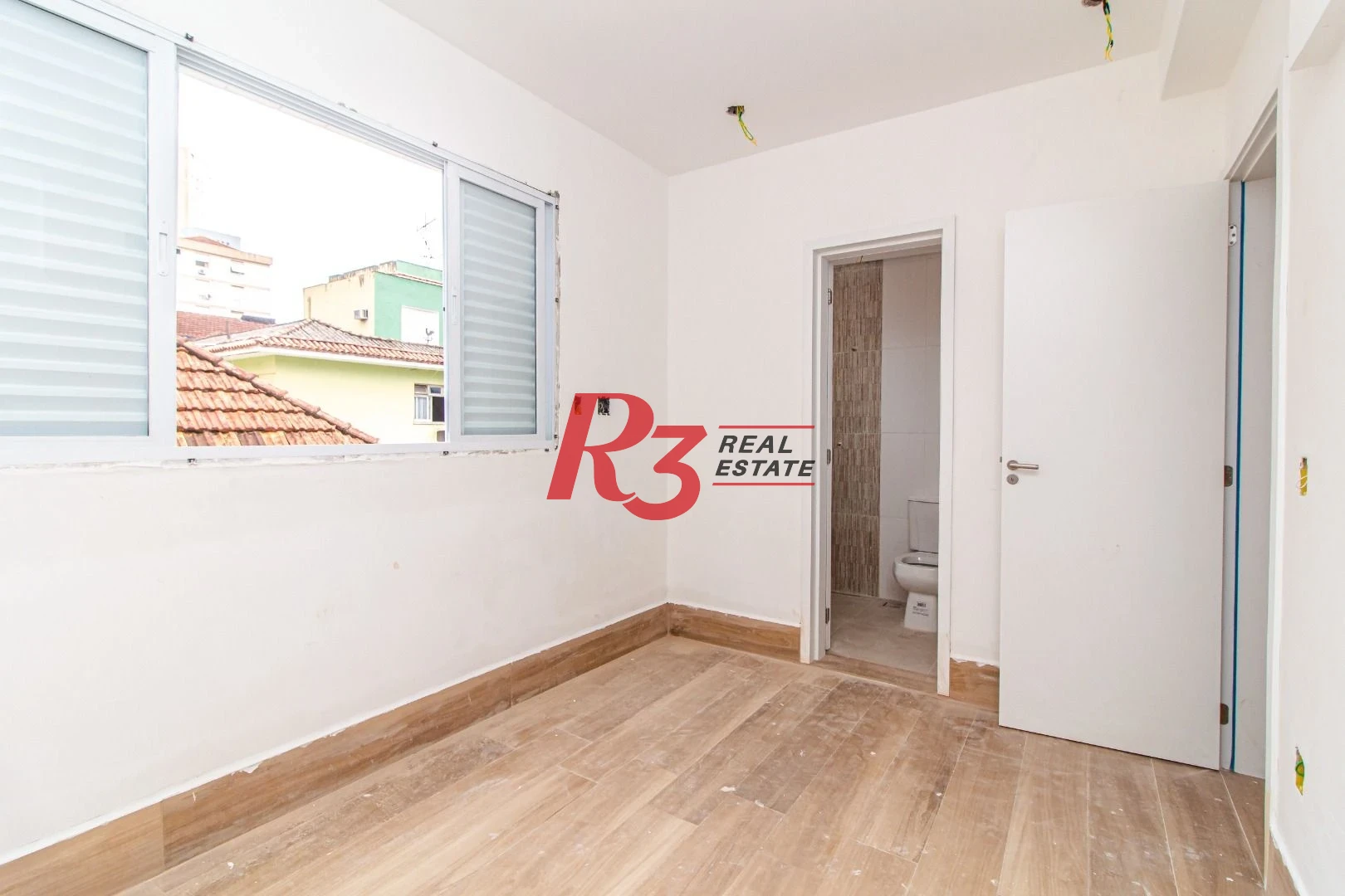 Sobrado com 3 dormitórios à venda, 137 m² - Gonzaga - Santos/SP