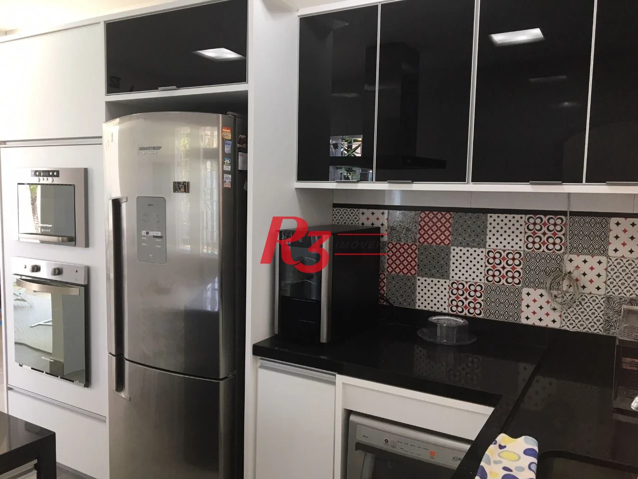 Casa com 3 dormitórios à venda, 200 m² por R$ 1.300.000,00 - Balneário Cidade Atlântica - Guarujá/SP