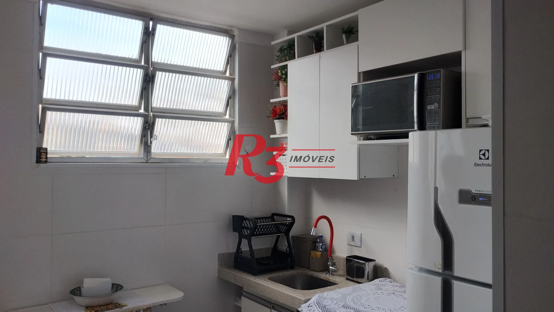 Apartamento com 1 dormitório para alugar, 57 m² por R$ 3.002,00/mês - José Menino - Santos/SP