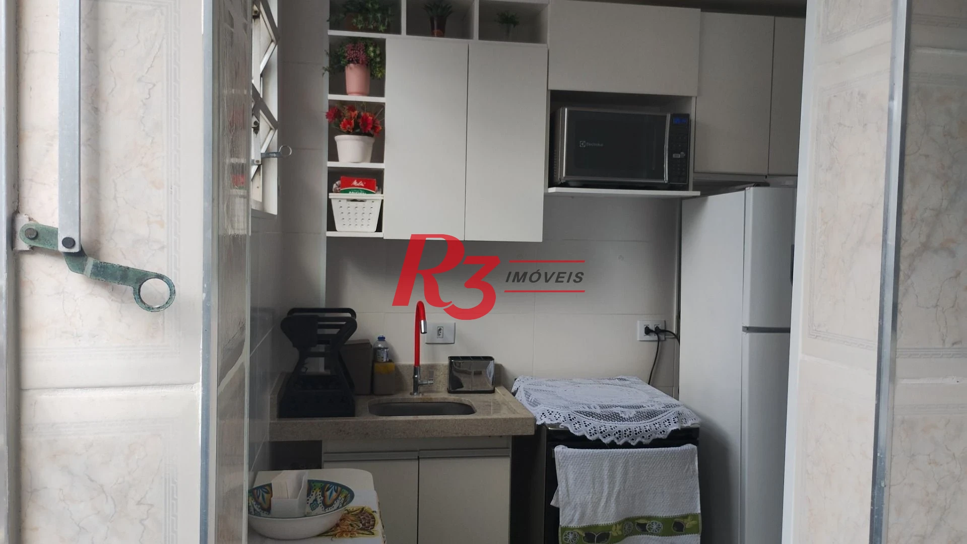 Apartamento com 1 dormitório para alugar, 57 m² por R$ 3.002,00/mês - José Menino - Santos/SP